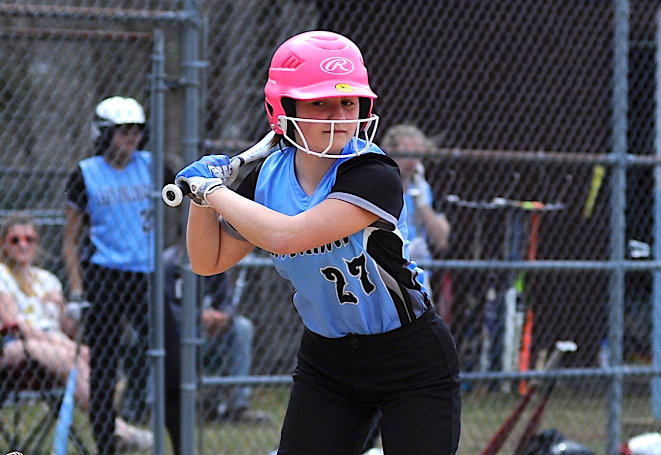 Annabelle Rutledge of the Lady Bulldogs strikes a pose with her hot pink battling helmet.